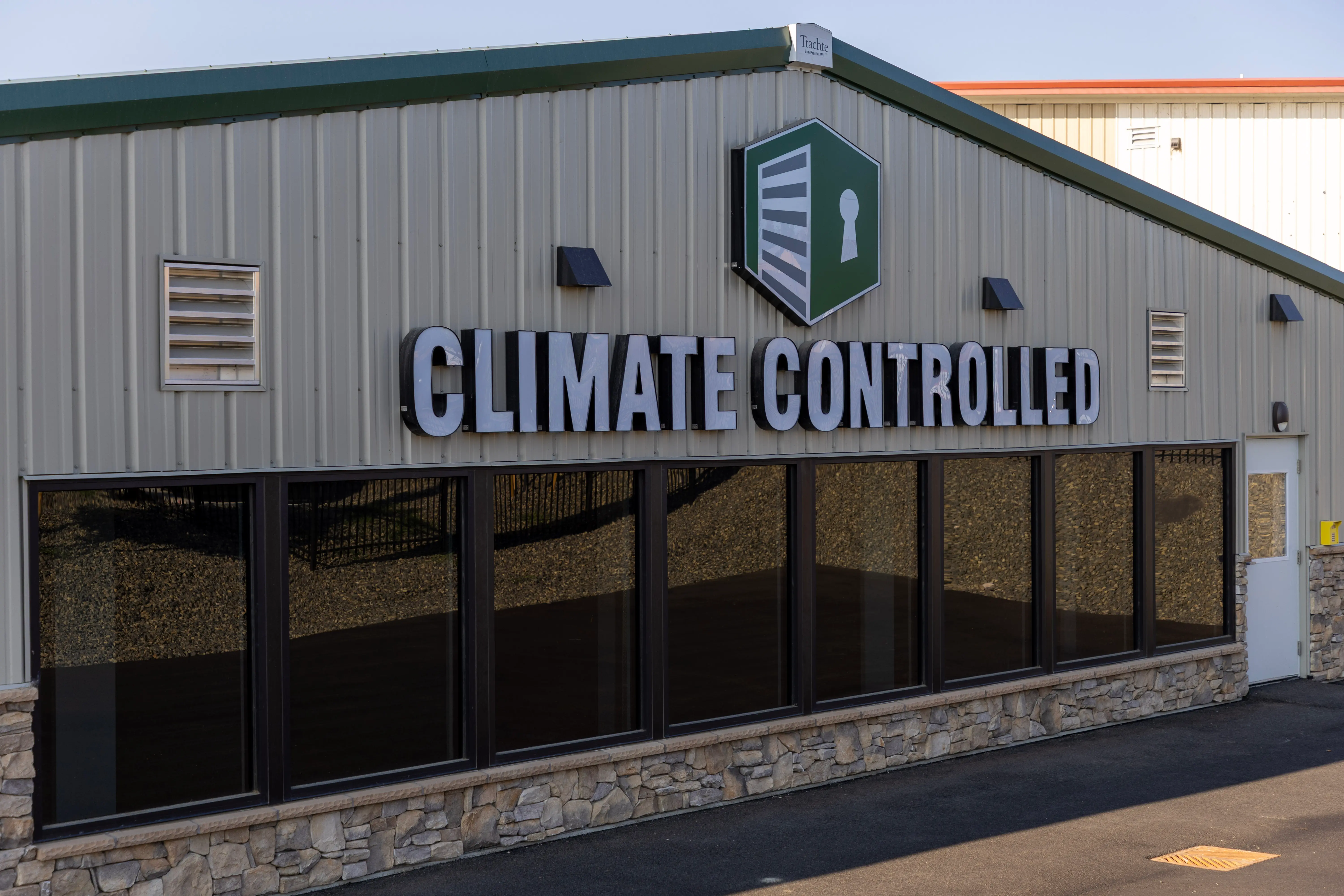 Climate-controlled building exterior with prominent CLIMATE CONTROLLED signage