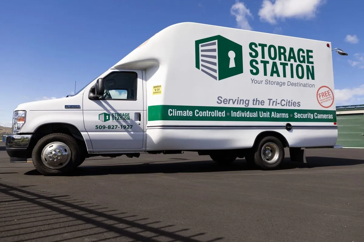 Storage Station moving truck — driver side view